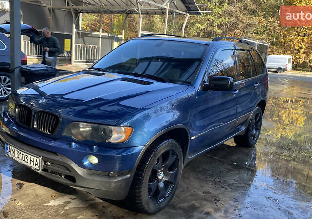 Синій БМВ Х5, об'ємом двигуна 4.4 л та пробігом 259 тис. км за 10000 $, фото 5 на Automoto.ua