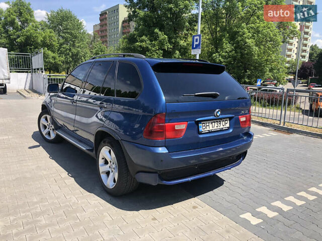 Синий БМВ Х5, объемом двигателя 3 л и пробегом 305 тыс. км за 9000 $, фото 4 на Automoto.ua