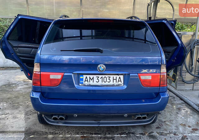 Синій БМВ Х5, об'ємом двигуна 4.4 л та пробігом 259 тис. км за 10000 $, фото 14 на Automoto.ua