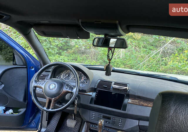 Синій БМВ Х5, об'ємом двигуна 4.4 л та пробігом 259 тис. км за 10000 $, фото 17 на Automoto.ua