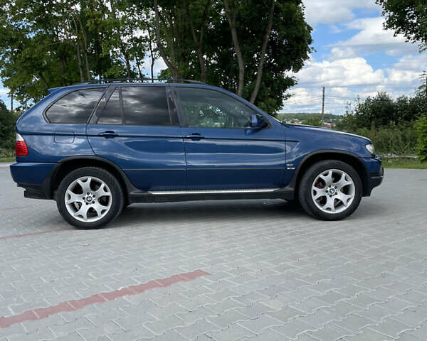 Синий БМВ Х5, объемом двигателя 3 л и пробегом 320 тыс. км за 8500 $, фото 4 на Automoto.ua