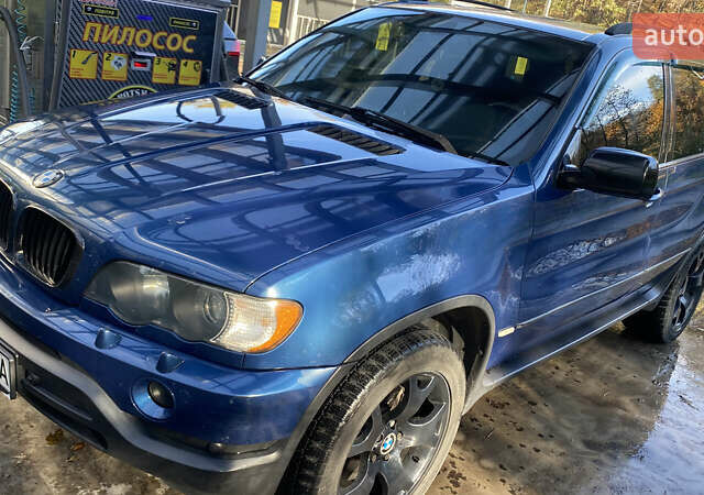 Синій БМВ Х5, об'ємом двигуна 4.4 л та пробігом 259 тис. км за 10000 $, фото 12 на Automoto.ua