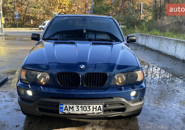 Синій БМВ Х5, об'ємом двигуна 4.4 л та пробігом 259 тис. км за 10000 $, фото 6 на Automoto.ua