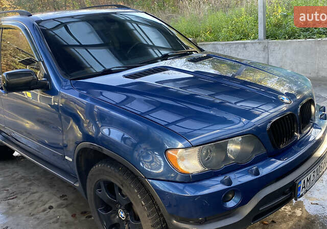 Синій БМВ Х5, об'ємом двигуна 4.4 л та пробігом 259 тис. км за 10000 $, фото 11 на Automoto.ua