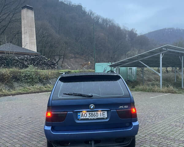 Синій БМВ Х5, об'ємом двигуна 3 л та пробігом 300 тис. км за 6500 $, фото 4 на Automoto.ua