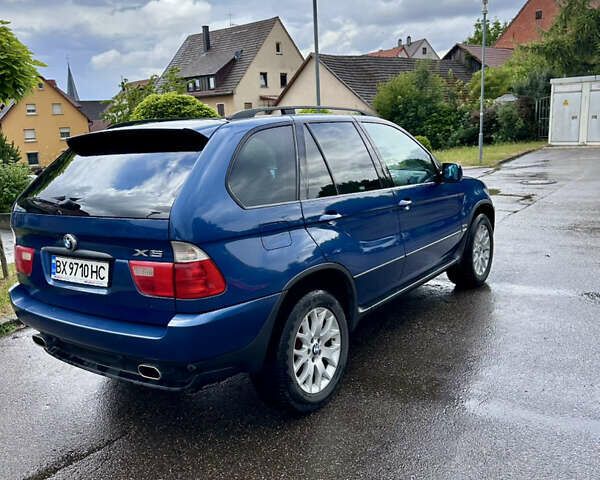 Синий БМВ Х5, объемом двигателя 3 л и пробегом 318 тыс. км за 7034 $, фото 4 на Automoto.ua