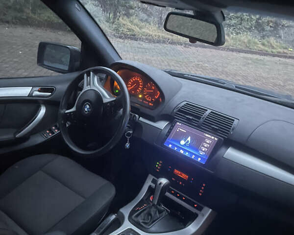 Синій БМВ Х5, об'ємом двигуна 3 л та пробігом 300 тис. км за 6500 $, фото 6 на Automoto.ua