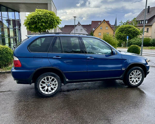 Синий БМВ Х5, объемом двигателя 3 л и пробегом 318 тыс. км за 7034 $, фото 2 на Automoto.ua