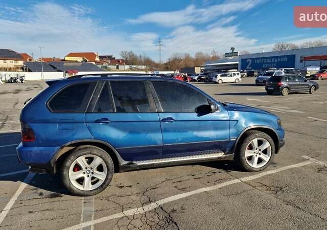 Синій БМВ Х5, об'ємом двигуна 3 л та пробігом 300 тис. км за 6950 $, фото 5 на Automoto.ua