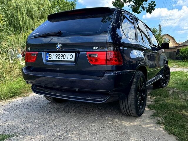 Синий БМВ Х5, объемом двигателя 3 л и пробегом 425 тыс. км за 10000 $, фото 4 на Automoto.ua