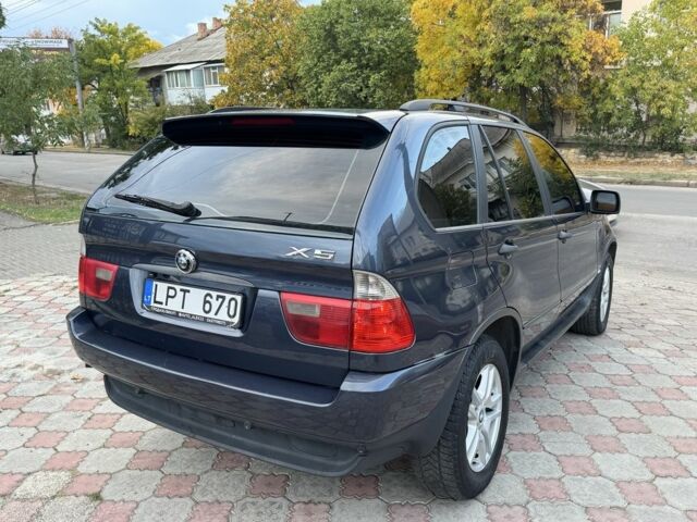 Синій БМВ Х5, об'ємом двигуна 3 л та пробігом 340 тис. км за 6299 $, фото 4 на Automoto.ua