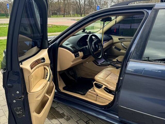 Синий БМВ Х5, объемом двигателя 3 л и пробегом 442 тыс. км за 10500 $, фото 7 на Automoto.ua