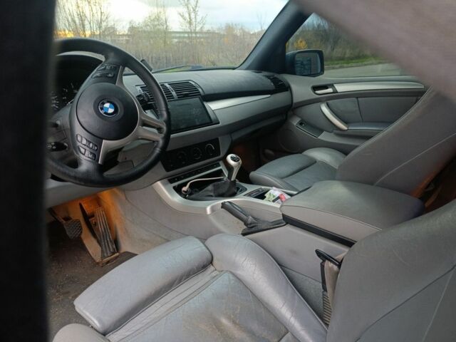 Синий БМВ Х5, объемом двигателя 3 л и пробегом 380 тыс. км за 6700 $, фото 7 на Automoto.ua