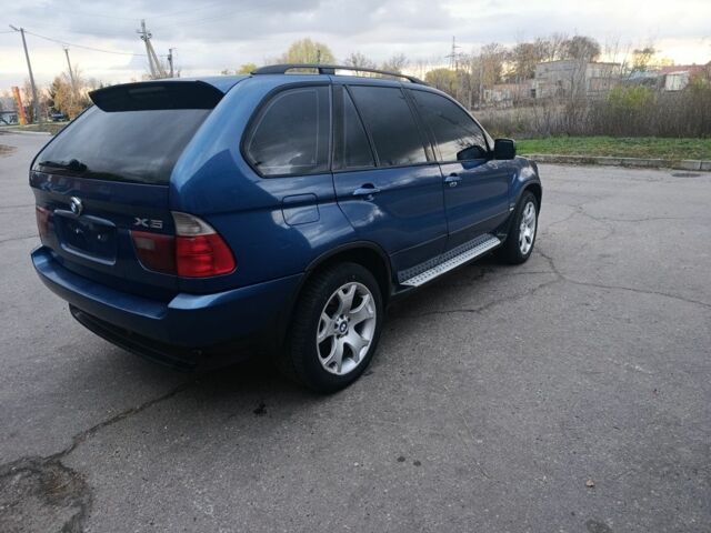 Синий БМВ Х5, объемом двигателя 3 л и пробегом 380 тыс. км за 6700 $, фото 3 на Automoto.ua