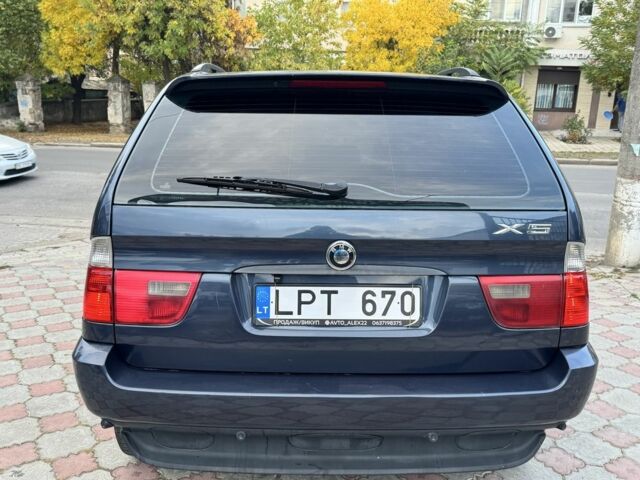 Синій БМВ Х5, об'ємом двигуна 3 л та пробігом 340 тис. км за 6299 $, фото 5 на Automoto.ua