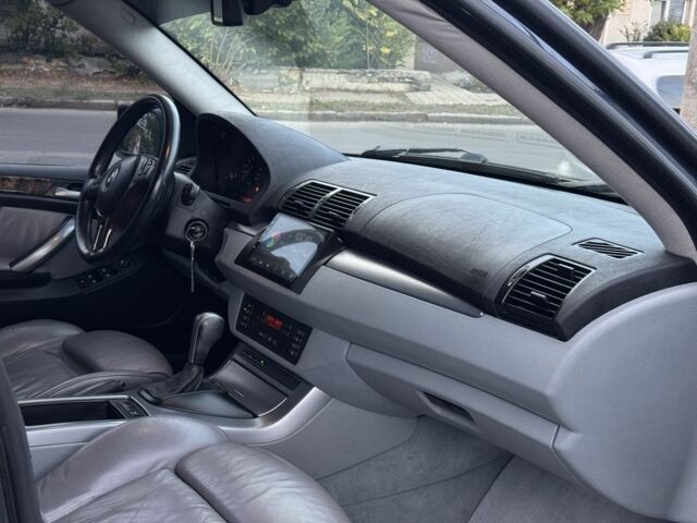 Синій БМВ Х5, об'ємом двигуна 3 л та пробігом 340 тис. км за 6299 $, фото 16 на Automoto.ua