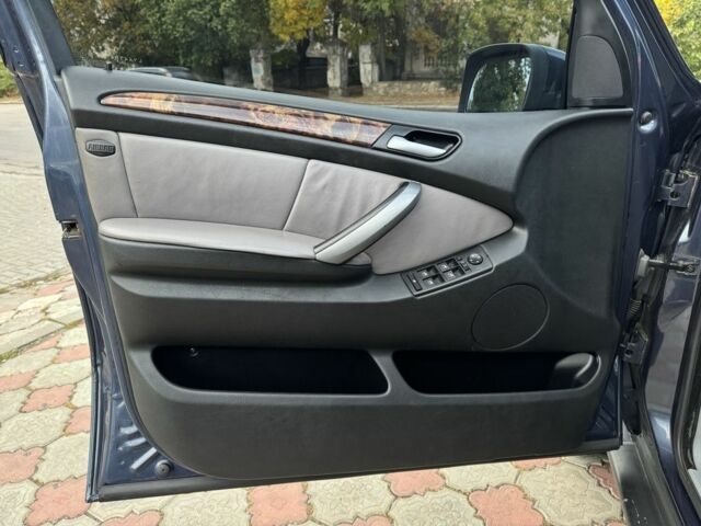 Синій БМВ Х5, об'ємом двигуна 3 л та пробігом 340 тис. км за 6299 $, фото 19 на Automoto.ua