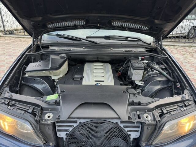 Синій БМВ Х5, об'ємом двигуна 3 л та пробігом 340 тис. км за 6299 $, фото 23 на Automoto.ua
