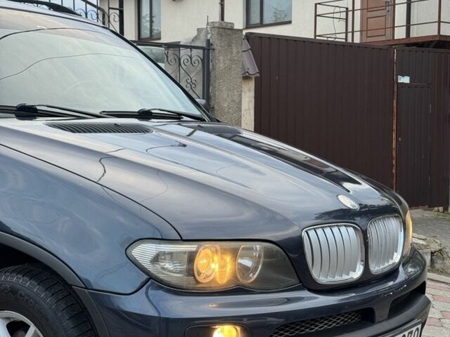 Синій БМВ Х5, об'ємом двигуна 3 л та пробігом 340 тис. км за 6299 $, фото 3 на Automoto.ua