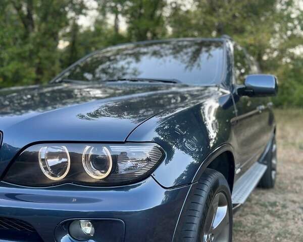 Синій БМВ Х5, об'ємом двигуна 2.99 л та пробігом 304 тис. км за 12000 $, фото 1 на Automoto.ua