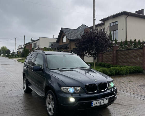 Синий БМВ Х5, объемом двигателя 3 л и пробегом 380 тыс. км за 9500 $, фото 2 на Automoto.ua