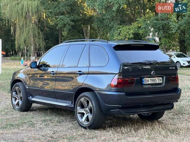 Синій БМВ Х5, об'ємом двигуна 2.99 л та пробігом 304 тис. км за 12000 $, фото 6 на Automoto.ua