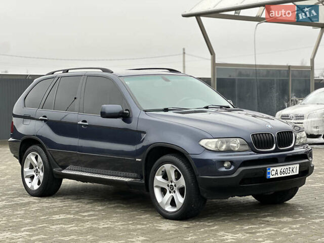 Синий БМВ Х5, объемом двигателя 3 л и пробегом 343 тыс. км за 9399 $, фото 6 на Automoto.ua