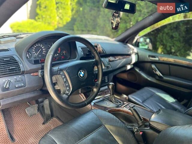 Синій БМВ Х5, об'ємом двигуна 2.99 л та пробігом 304 тис. км за 12000 $, фото 7 на Automoto.ua