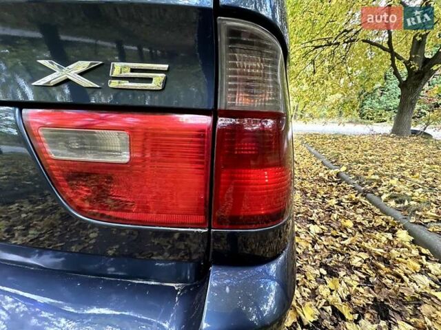 Синий БМВ Х5, объемом двигателя 2.99 л и пробегом 340 тыс. км за 9500 $, фото 23 на Automoto.ua