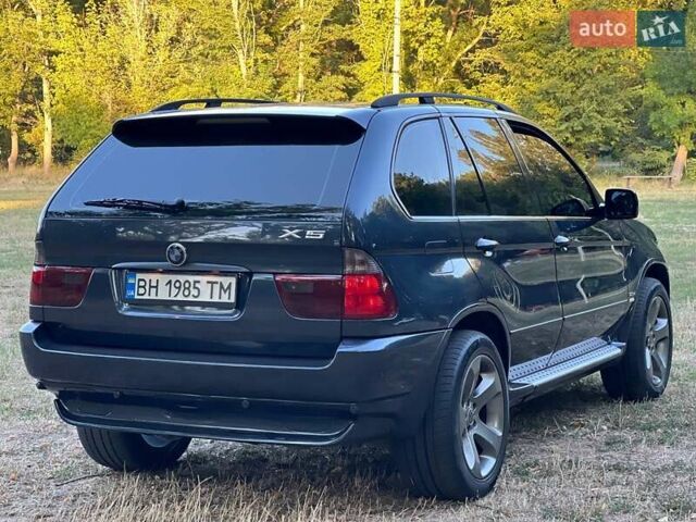 Синій БМВ Х5, об'ємом двигуна 2.99 л та пробігом 304 тис. км за 12000 $, фото 4 на Automoto.ua
