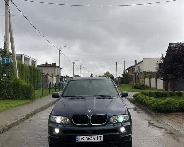 Синий БМВ Х5, объемом двигателя 3 л и пробегом 380 тыс. км за 9500 $, фото 1 на Automoto.ua