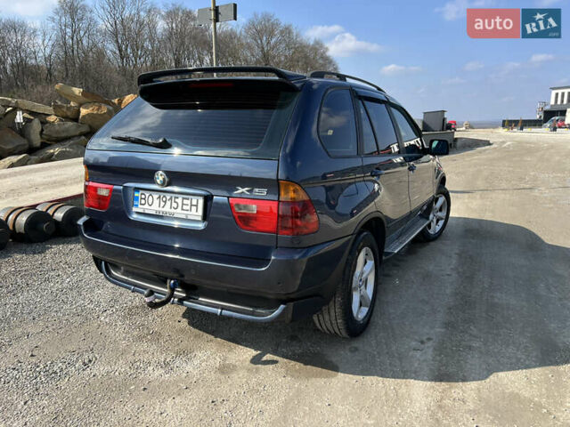 Синій БМВ Х5, об'ємом двигуна 3 л та пробігом 260 тис. км за 11500 $, фото 4 на Automoto.ua