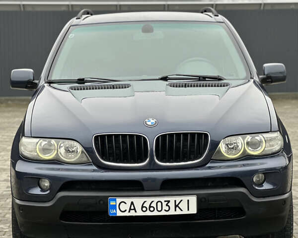 Синий БМВ Х5, объемом двигателя 3 л и пробегом 343 тыс. км за 9399 $, фото 1 на Automoto.ua