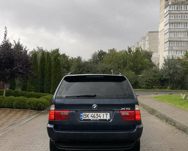 Синий БМВ Х5, объемом двигателя 3 л и пробегом 380 тыс. км за 9500 $, фото 4 на Automoto.ua