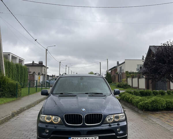 Синий БМВ Х5, объемом двигателя 3 л и пробегом 380 тыс. км за 9500 $, фото 9 на Automoto.ua