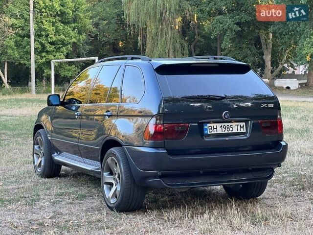 Синій БМВ Х5, об'ємом двигуна 2.99 л та пробігом 304 тис. км за 12000 $, фото 5 на Automoto.ua