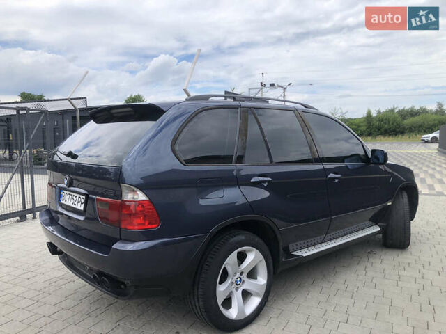 Синій БМВ Х5, об'ємом двигуна 3 л та пробігом 290 тис. км за 10500 $, фото 5 на Automoto.ua