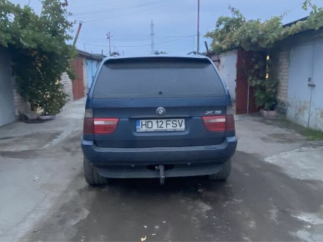 Синій БМВ Х5, об'ємом двигуна 3 л та пробігом 260 тис. км за 4800 $, фото 4 на Automoto.ua