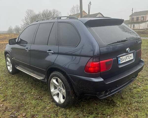 Синій БМВ Х5, об'ємом двигуна 2.99 л та пробігом 400 тис. км за 10500 $, фото 1 на Automoto.ua