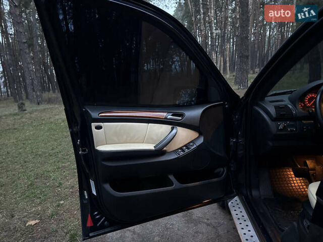 Синий БМВ Х5, объемом двигателя 3 л и пробегом 333 тыс. км за 9700 $, фото 26 на Automoto.ua