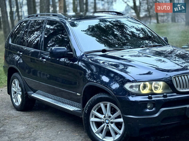 Синий БМВ Х5, объемом двигателя 3 л и пробегом 333 тыс. км за 9700 $, фото 12 на Automoto.ua