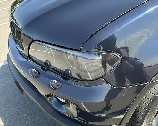 Синий БМВ Х5, объемом двигателя 3 л и пробегом 279 тыс. км за 11200 $, фото 8 на Automoto.ua