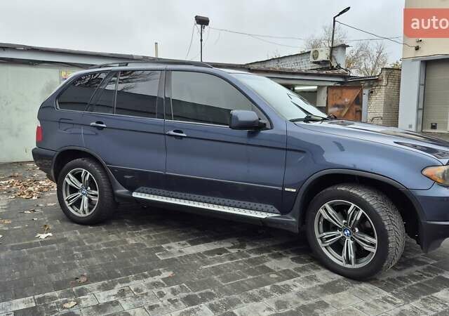 Синий БМВ Х5, объемом двигателя 4.4 л и пробегом 301 тыс. км за 8900 $, фото 4 на Automoto.ua