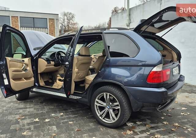 Синий БМВ Х5, объемом двигателя 4.4 л и пробегом 301 тыс. км за 8900 $, фото 20 на Automoto.ua