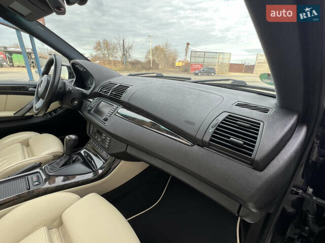 Синій БМВ Х5, об'ємом двигуна 3 л та пробігом 221 тис. км за 19300 $, фото 75 на Automoto.ua