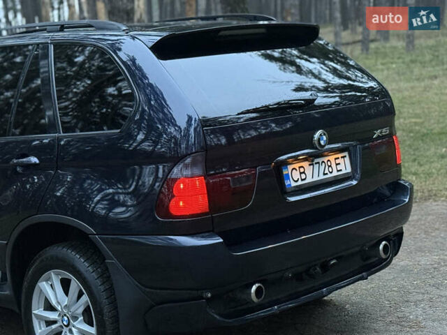 Синий БМВ Х5, объемом двигателя 3 л и пробегом 333 тыс. км за 9700 $, фото 5 на Automoto.ua
