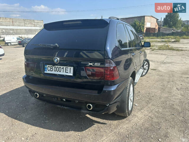 Синій БМВ Х5, об'ємом двигуна 2.98 л та пробігом 331 тис. км за 10999 $, фото 13 на Automoto.ua