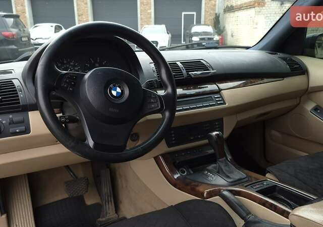 Синий БМВ Х5, объемом двигателя 4.4 л и пробегом 301 тыс. км за 8900 $, фото 16 на Automoto.ua