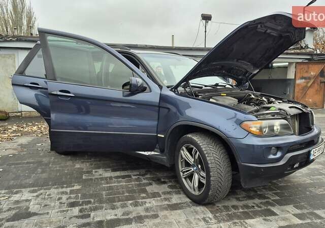 Синий БМВ Х5, объемом двигателя 4.4 л и пробегом 301 тыс. км за 8900 $, фото 23 на Automoto.ua