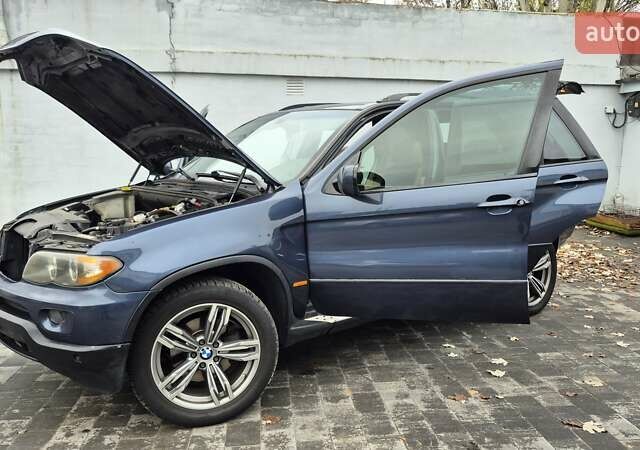 Синий БМВ Х5, объемом двигателя 4.4 л и пробегом 301 тыс. км за 8900 $, фото 22 на Automoto.ua